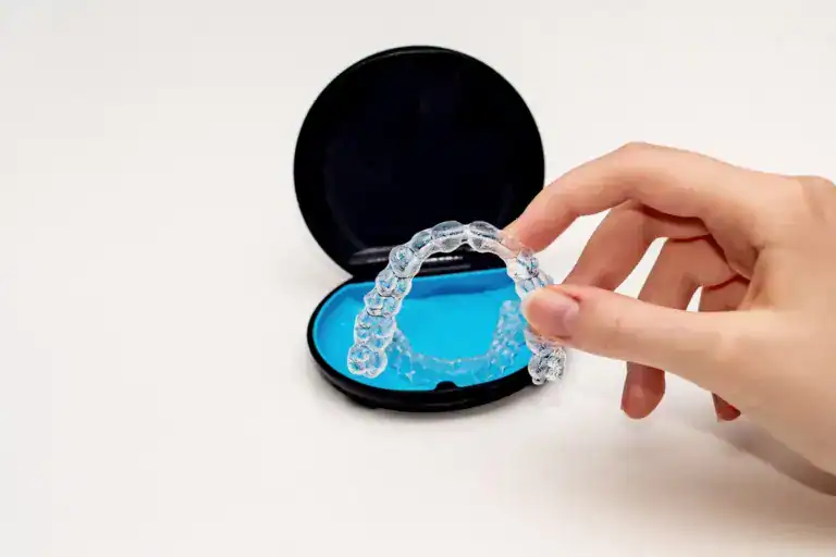 Clear aligner in open case, dental orthodontic treatment, Invisalign, teeth straightening.